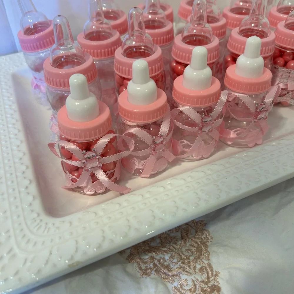 12 or more 1.50$each 18 $ for 12Pink Baby Bottle Party Favors